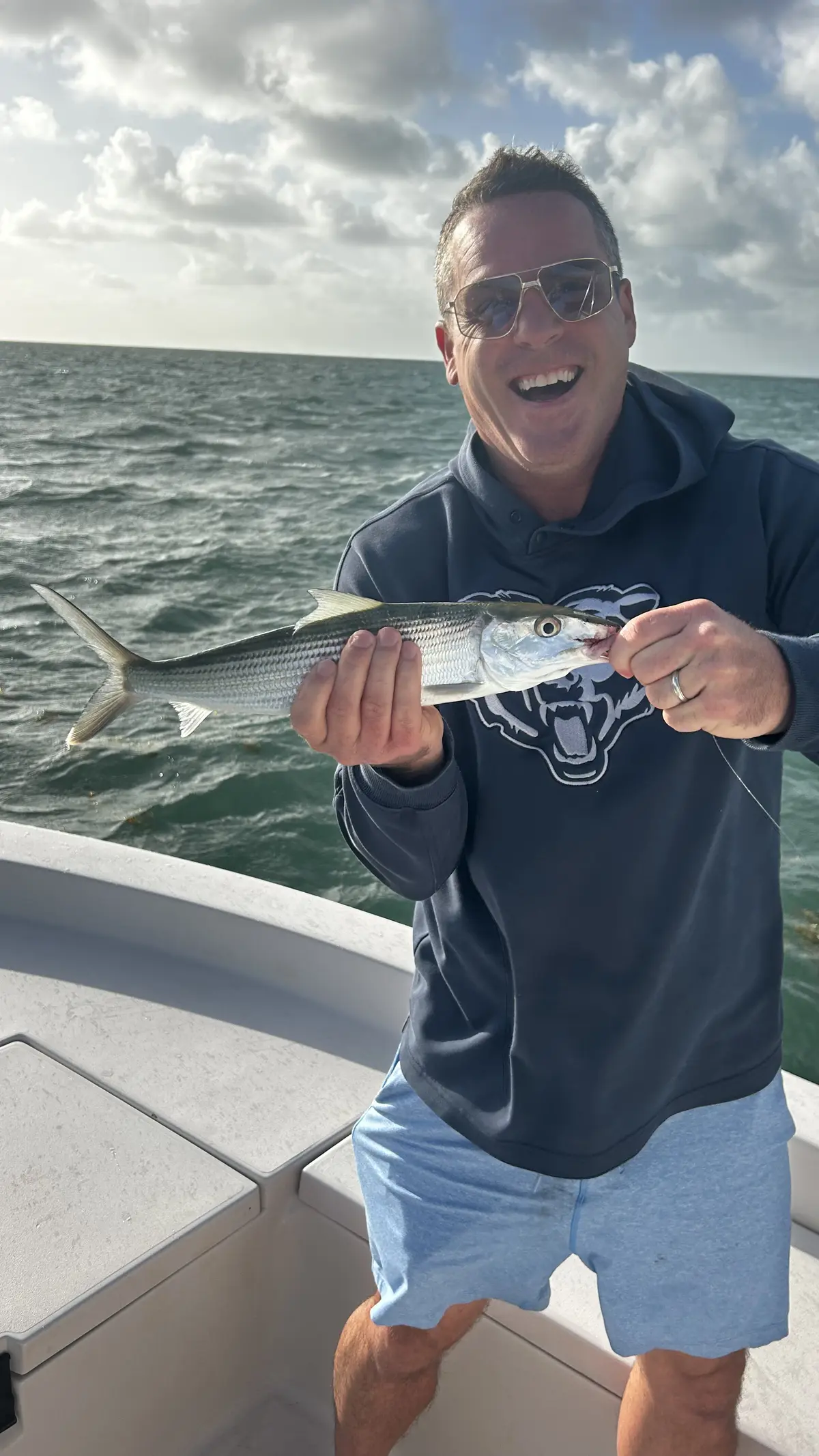 Angler with a great catch on a Miami Bay inshore fishing charter on Biscayne Bay